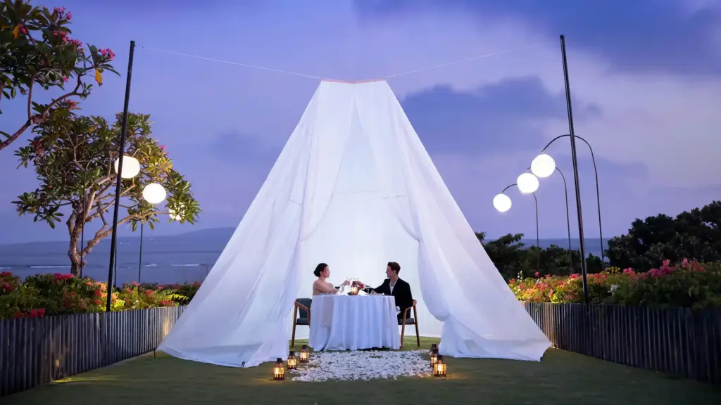 A romantic table set up outdoors in Sanur