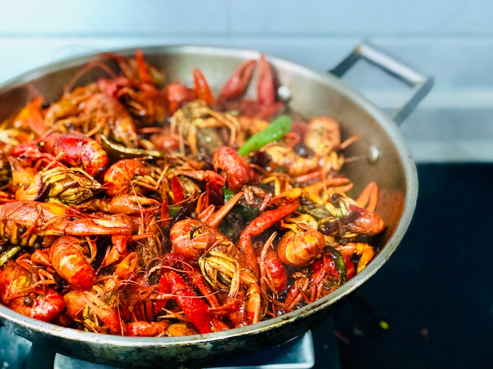 baby lobsters in a frying pan