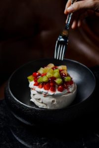 A pavlova dessert at a steakhouse