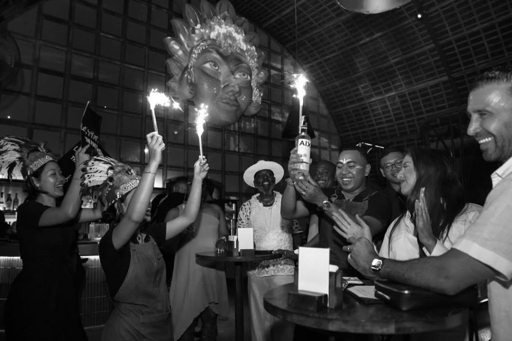 A celebratory bottle being served by staff at Akar by K‑Club