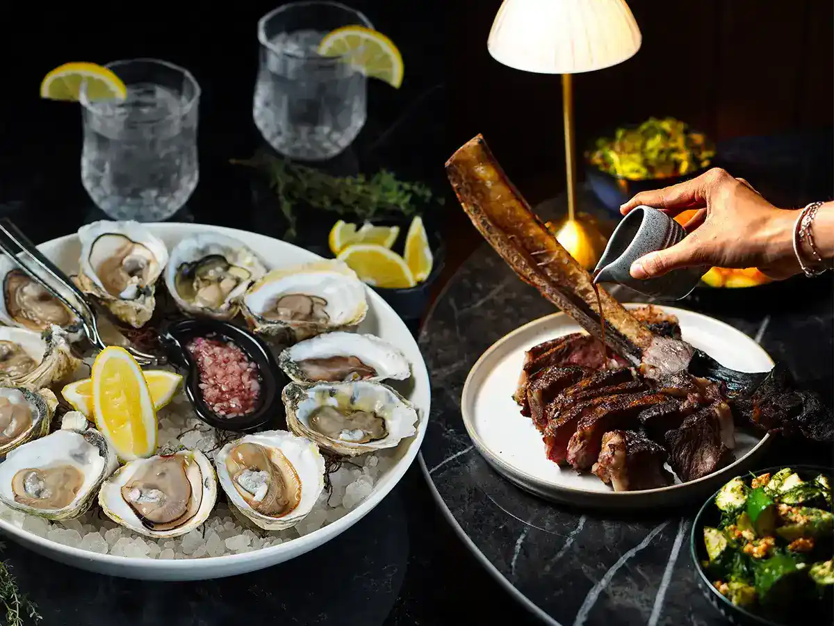 Oysters, steak and sides from Blossom Steakhouse in Sanur